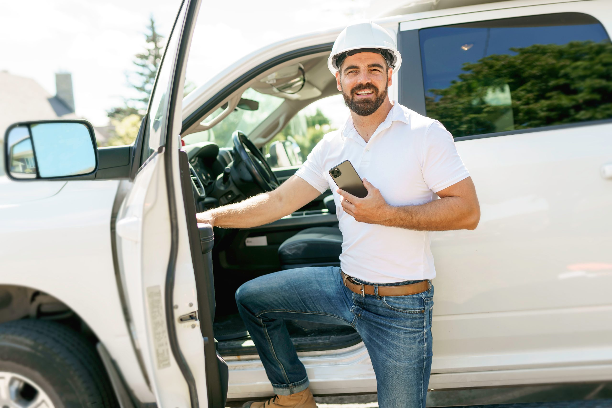 contractor standing outside of a commercial truck
